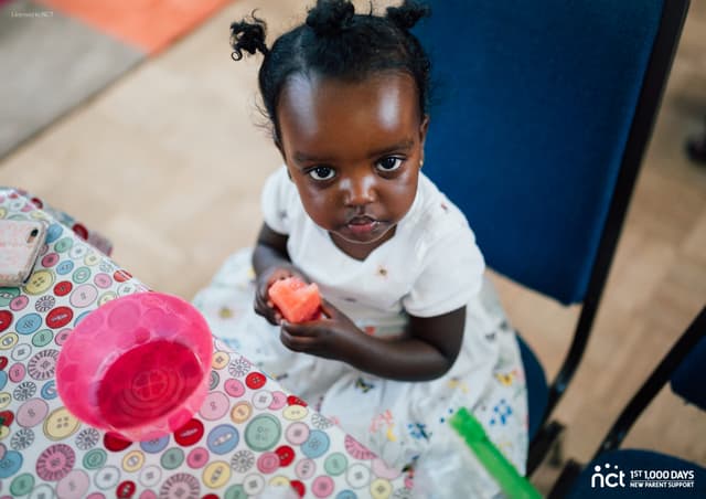 Toddler with bowl